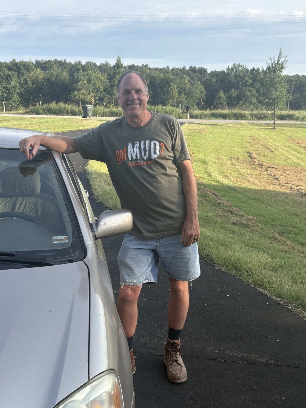 Matt Reynolds standing beside his mobile service vehicle.
